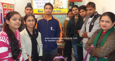 a group of people standing in front of a poster