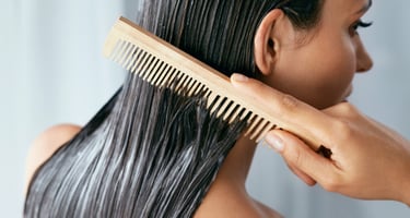 Woman with hair cream