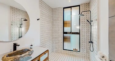 a bathroom with a sink and a large mirror