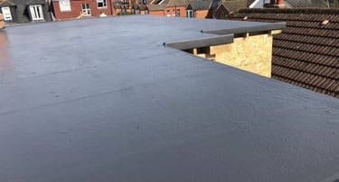 Flat roof dormer loft extension being completed on Brighton house.