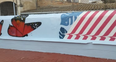 graffiti mural escuela mariposas tramas colores