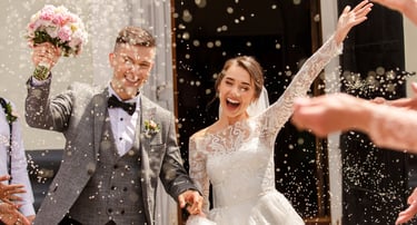 Wedding videographer Glasgow shooting joyful confetti moment at outdoor ceremony in Central Scotland