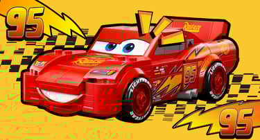LEGO Lightning McQueen with yellow background, big smile, and number 95 lightning bolts.