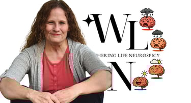 Terrie Hein, ADHD life coach and founder of Weathering Life Neurospicy, sitting in front of the WLN