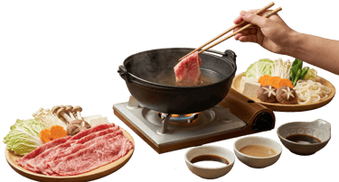 Thinly sliced premium beef and fresh vegetables prepared for a traditional Japanese shabu-shabu style hotpot.