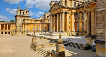 Blenheim Palace buildingBlenheim Palace exterior on a sunny day, viewed from the formal gardens