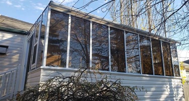 Solarium with tinted, double-glazed acrylic panels..
