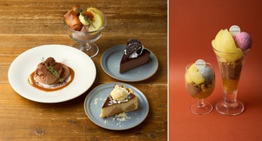 木目のテーブル上から時計回りで「チョコレートとキャラメリゼ林檎のミニパフェ」「カカオ75％チョコレートのバスクチーズケーキ」「林檎とホワイトチョコレートのバスクチーズケーキ」「スイートチョコレートティラミス」と赤色背景は「林檎とチョコレートのパフェ」