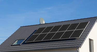 a solar paneled roof with a satellite dish dish on top of a house