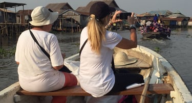 Tourists Visiting Ganvie stilt village during a Multi-country Trips of Senegal, Ivory Coast & Benin