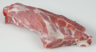 Raw half a shoulder of lamb