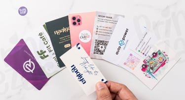 Business card printing UAE — matte laminated, gold foil, spot UV business cards by Printezar Studio 