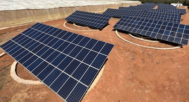 a group of solar panels installed on a roof