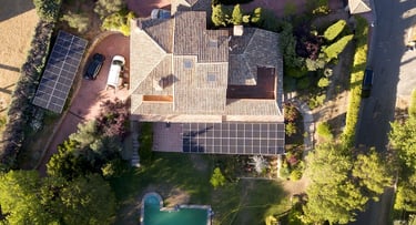 a house with solar panels installed on a roof