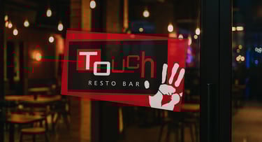 a sign that says touch restaurant and resto bar
