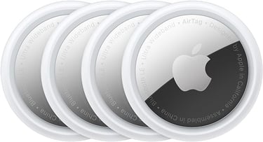 a group of four apple airtags