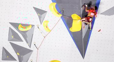 a man lead climbing 