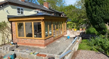 brick and wood conservatory constructed lakes building and plastering services