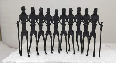 "Handcrafted tribal iron art sculpture of 10 Adivasi dancers performing group dance – front view-Prepared for export"