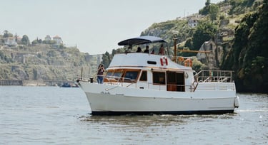 Private vintage party boat cruising on the Douro River in Porto