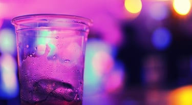 a glass of soda on a table
