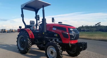 a red tractor with a canopy over it