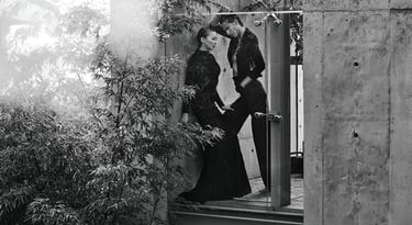 Elizabeth Lotz (Liz Lotz) art director fashion editorial in architectural landscape with two models in black and white elegan