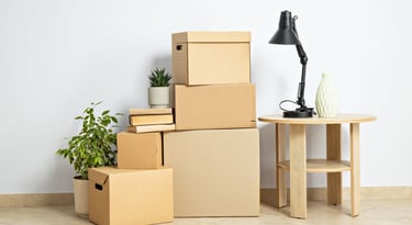 Packed boxes and decor — downsizing and transitions support by simplelilac