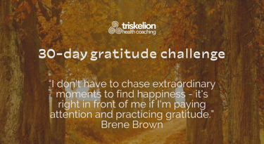 a road leading through trees with a brene brown quote about gratitude