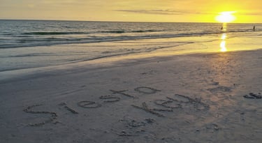 photo of the words Siesta Key written in the sand on Siesta Key