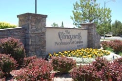 a sign that says vineyards professional campus
