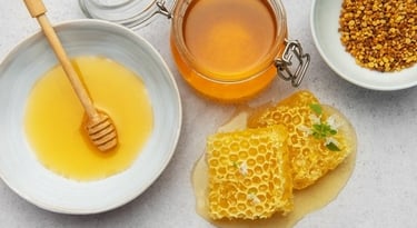 a bowl of honeycomb and honey