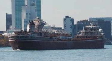 Classic freighter Wilfred Sykes passing the Windsor skyline.