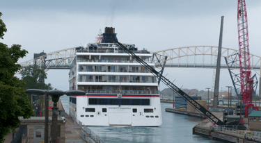 The stern of cruise ship Hanseatic Inspiration, as she exits the MacArthur Lock.