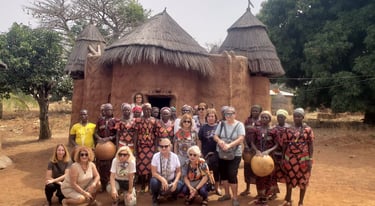 A group of Tourists visiting Tata Somba Village during a Multi-country Trips of Benin, Togo & Ghana