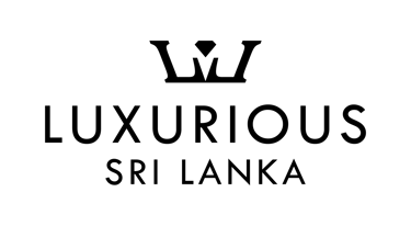 Luxurious Trails logo with crown icon and elegant typography for a luxury travel brand