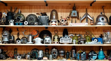 Shelves of parts in artist Tal Avitzur's workshop.