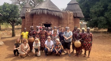 A group of Tourists visiting Tata Somba Village during a Multi-country Trips of Benin, Togo & Ghana