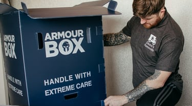 deano removals worker next to a storage box