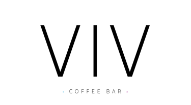 a man in a suit and tie is holding a microphone