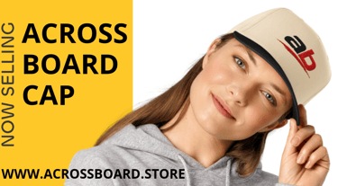 A woman wearing a tan and black Across Board trucker cap in an advertisement.