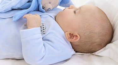 bébé qui dort car ses parents sont accompagnés par une puéricultrice spécialisée dans le sommeil