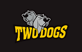 two dogs are standing next to each other