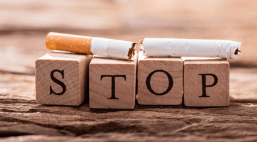 photo d'une cigarette cassée avec le mot STOP