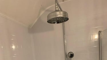 Shower repairs carried out by AXM Plumbing Services in Droitwich