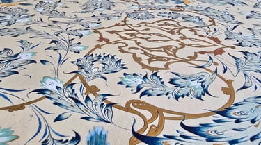 a large rug with a large floral pattern on it