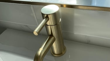 Bathroom taps showing stronger pressure following booster pump installation in Droitwich