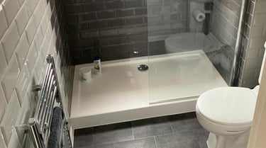 Shower fitting service provided by AXM Plumbing Services in Hereford