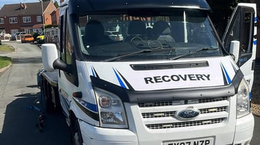 alt="Non-runner vehicle being collected for garage delivery in Malvern"