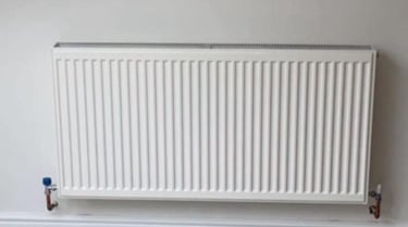 wall-mounted towel rail radiator installed by Gas Safe engineer in Evesham